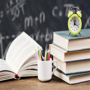 Clock Top Textbooks Teacher Desk